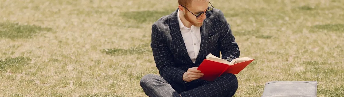 Spider mite webbing visible on the underside of a plant leaf with mite damage