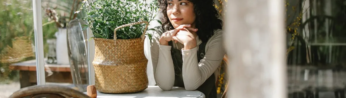 Green aphids clustered on a plant stem — how to get rid of aphids guide